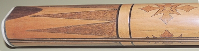 Hand carved pool cue inlay