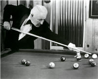Photo of Willie Mosconi playing billiards #1