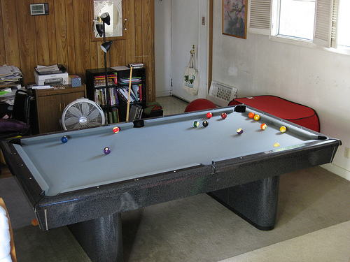 Billiard Table in Crowded Living Room